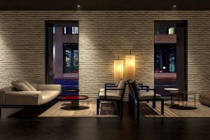 lobby with low lights and minimalist furniture design by Piero Lissoni in AKA NoMad