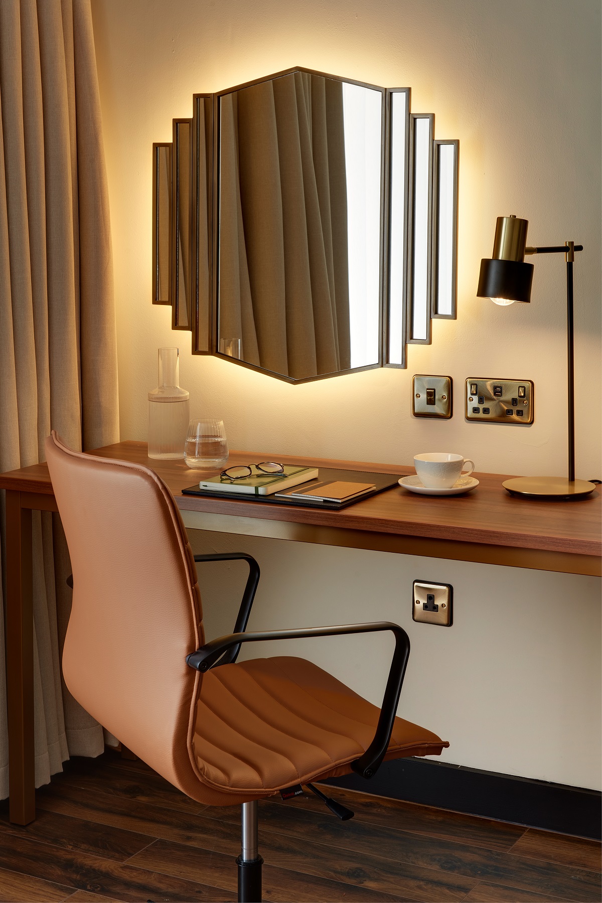 desk in Brama guestroom with chair and deco style mirror