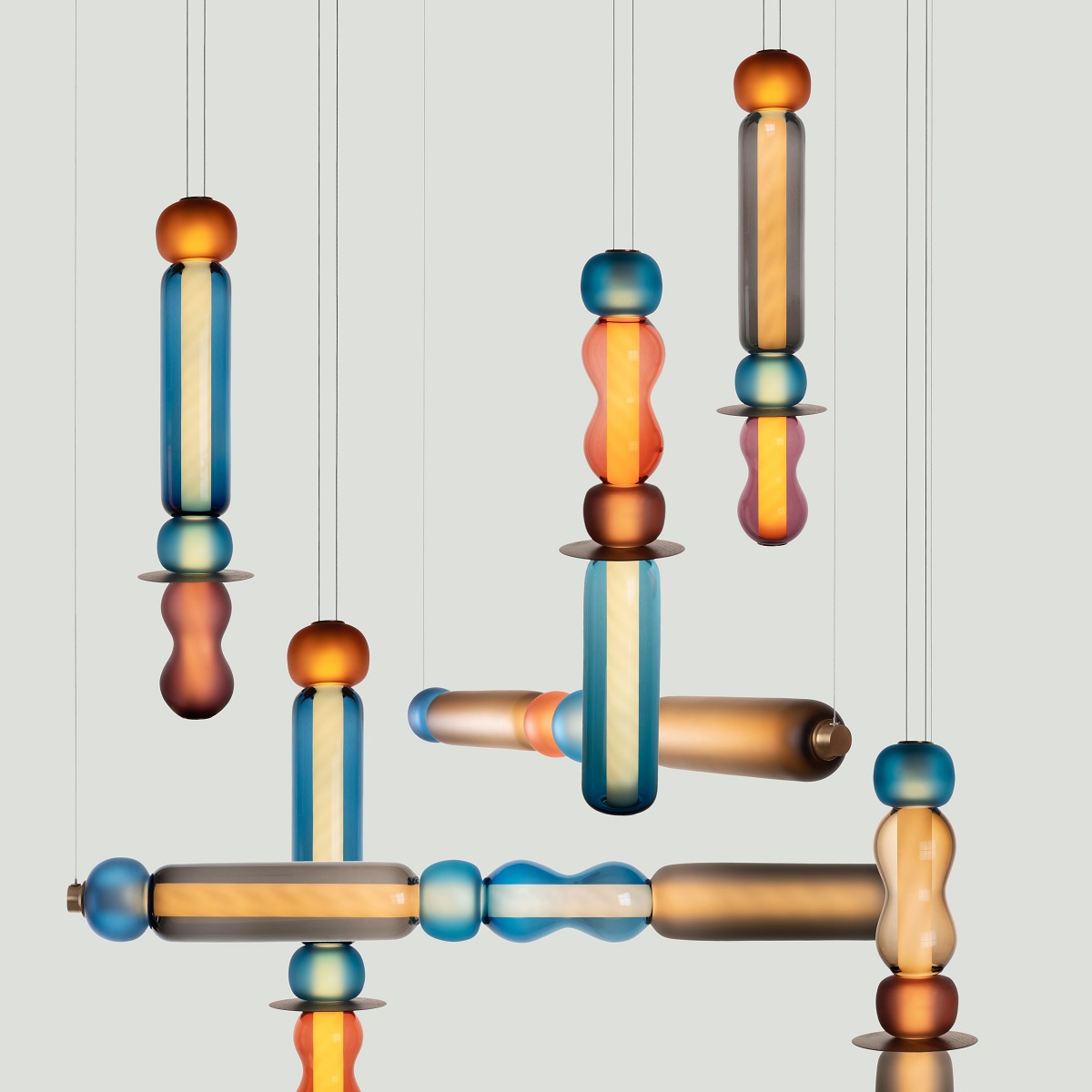 hand blown glass chandelier by curiosa on display at CDW23