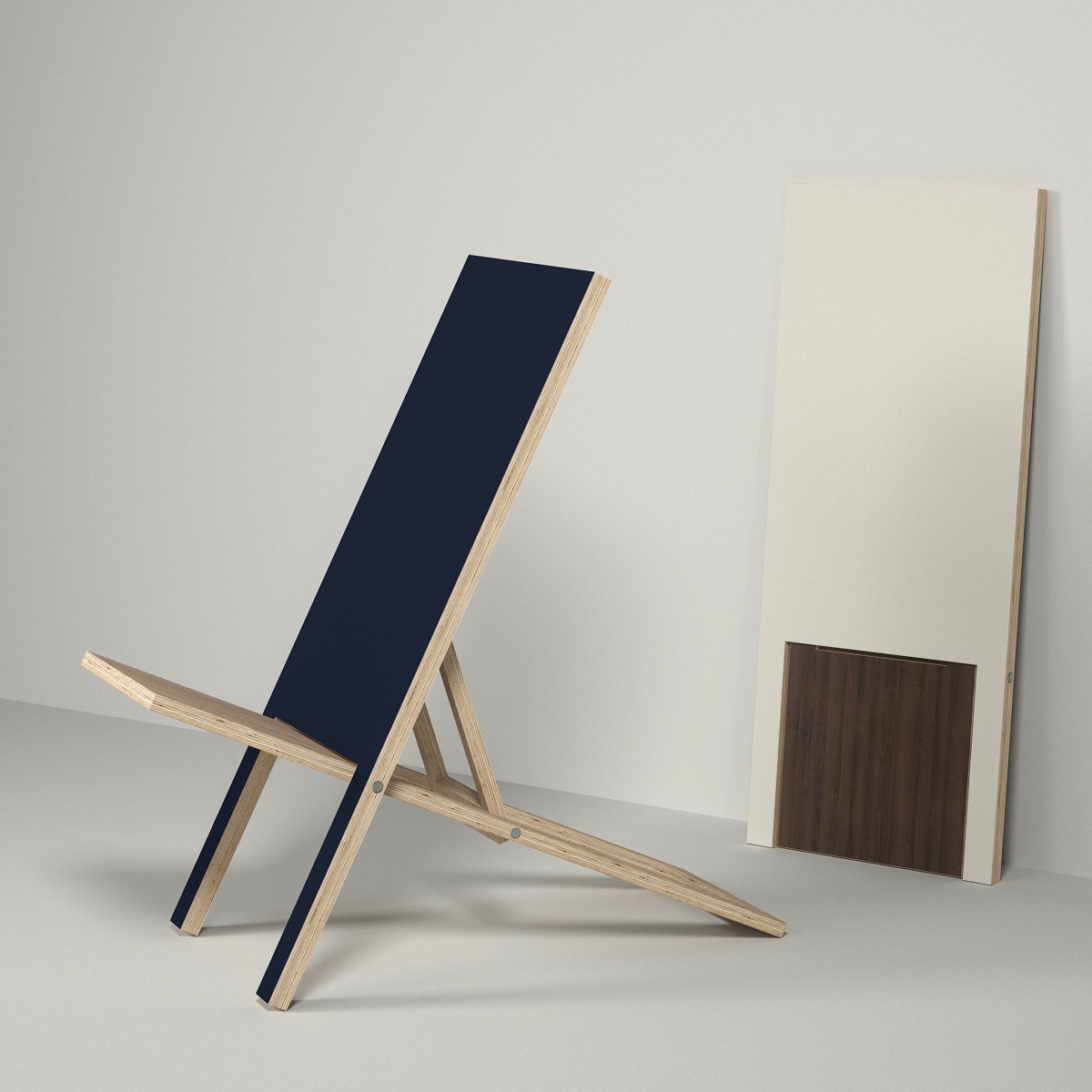 foldable low deckchair in black and natural wood designed by Kostas Synodis