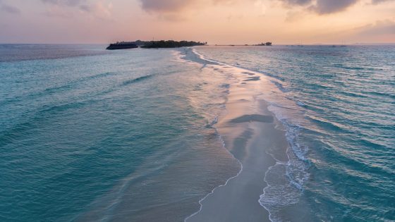 sunset at island in the Maldives and proposed site for Rosewood Ranfaru