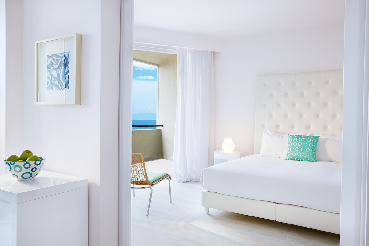 White and turquise interior design scene inside Domes hotel suite in Greece