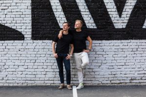founders of Bob W seb and Niko standing against a painted brick wall