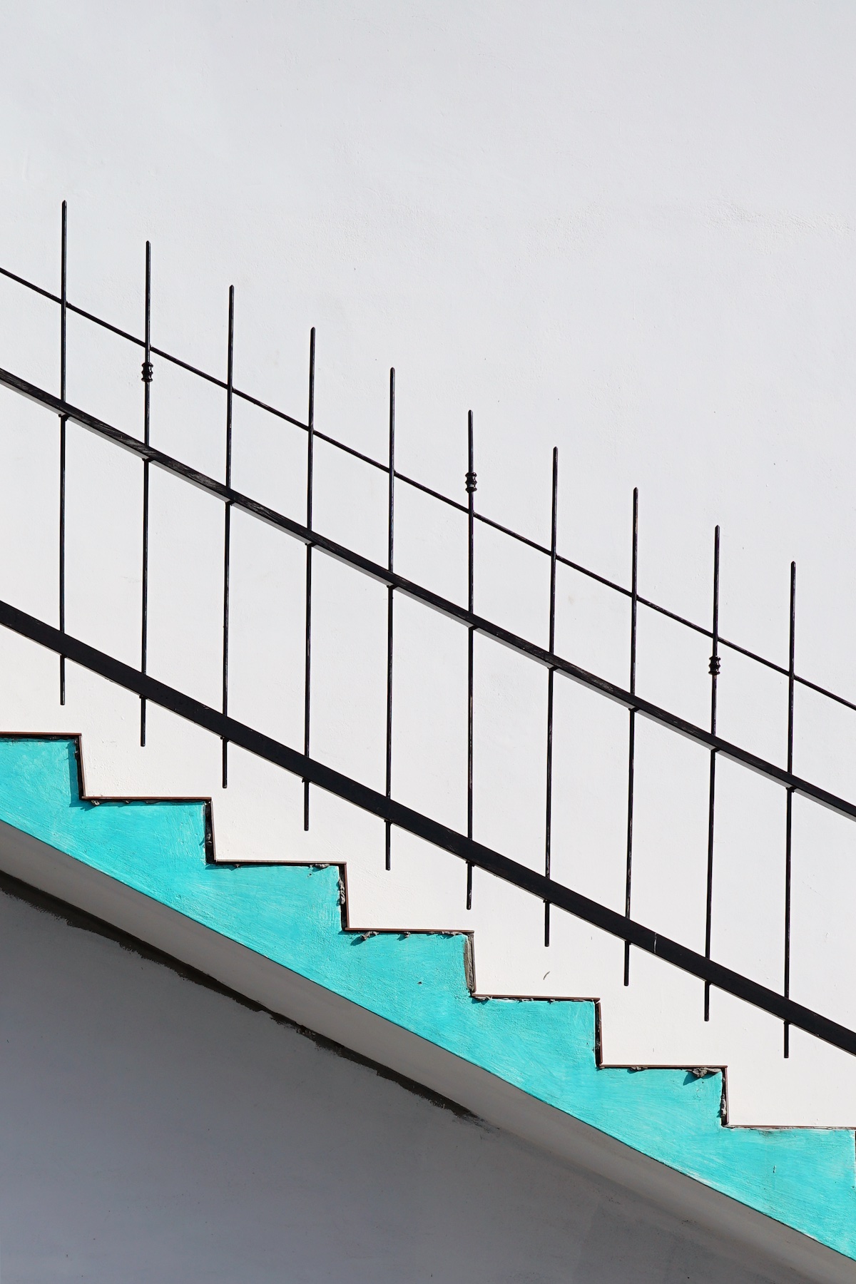 Outdoor stairs with an outline of light blue