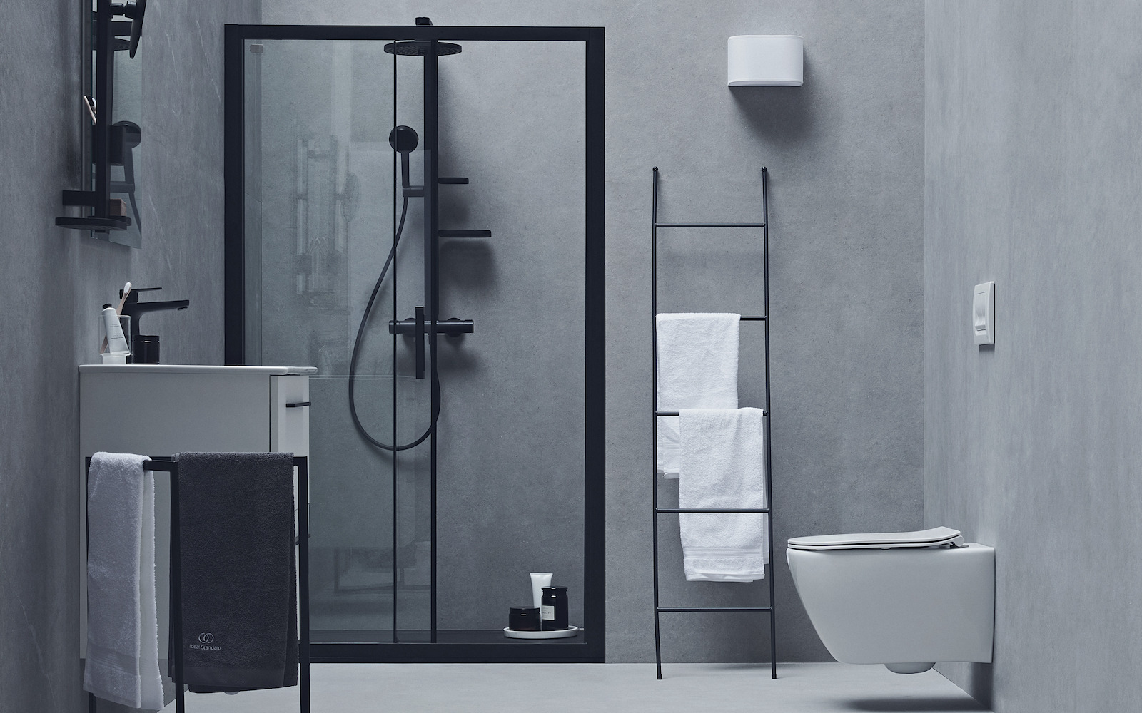 A grey and black modern bathroom setting