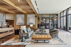 leather benches, wooden floors and beams and comfortable seating in the space around the lobby and clubhouse