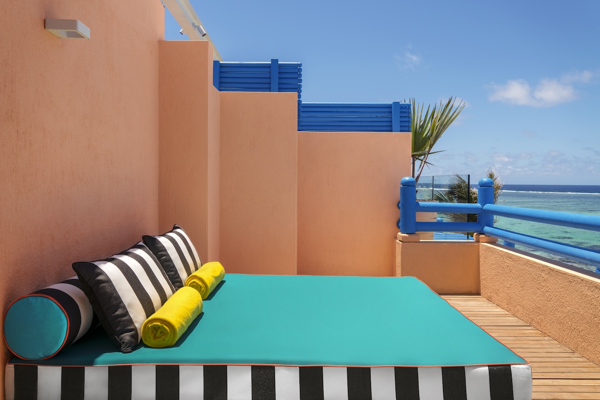 A colourful outdoor bed overlooking the ocean in Mauritus