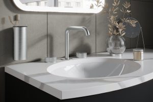 bathroom vanity with white integrated sink and chrome tap