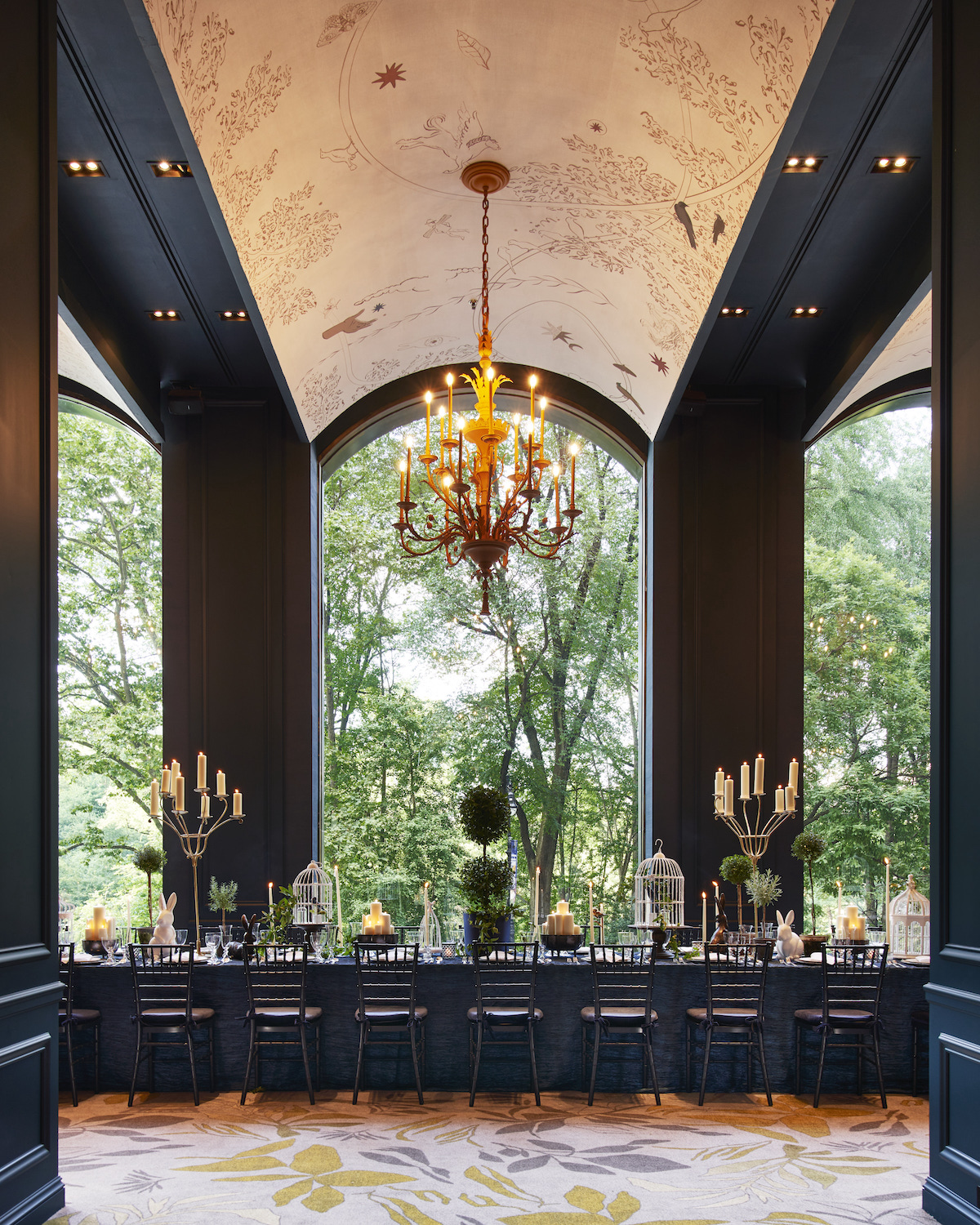 Dramatic chandelier above large dining table
