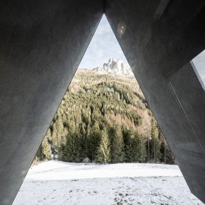 concrete walls and structure frame triangular view onto the surrounding mountains