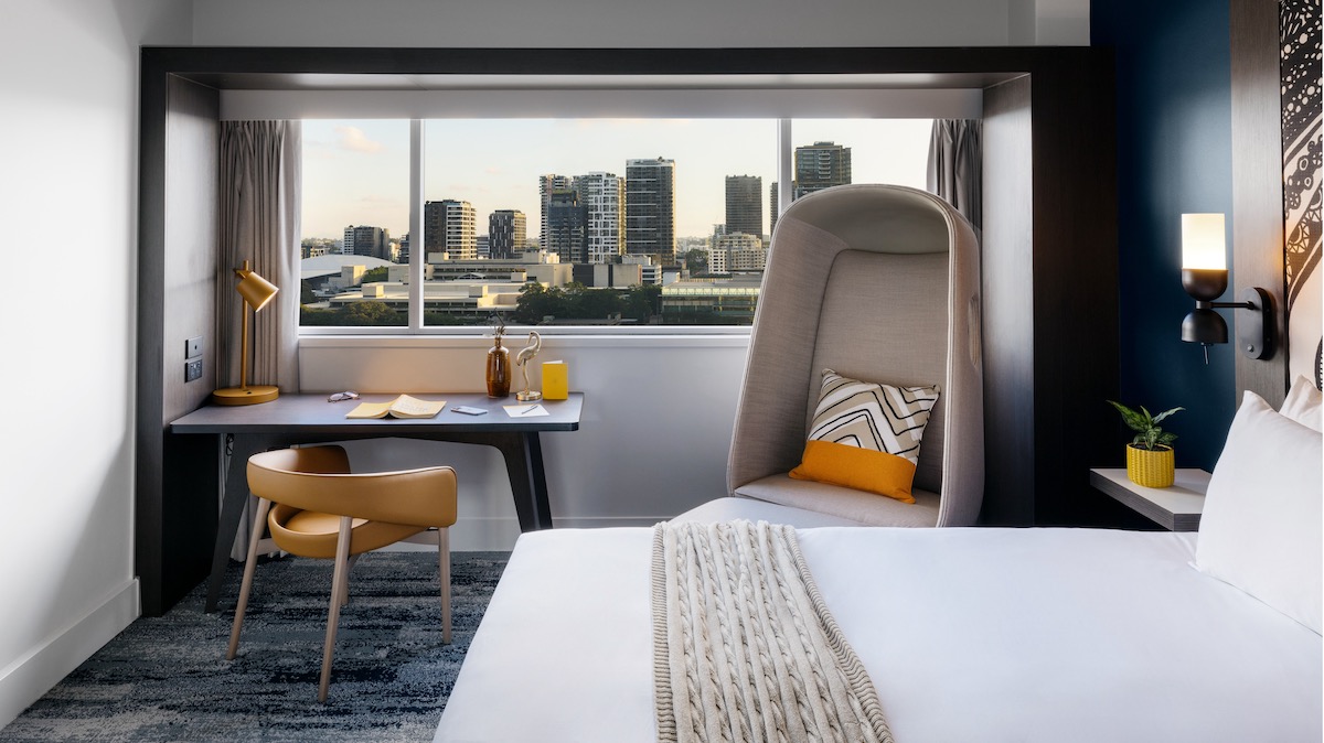 Room in hotel overlooking Brisbane cityscape