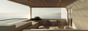 open air room with natural stone, bamboo shade and views across aegean 