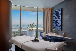 spa treatment bed with view out to sea on the horizon