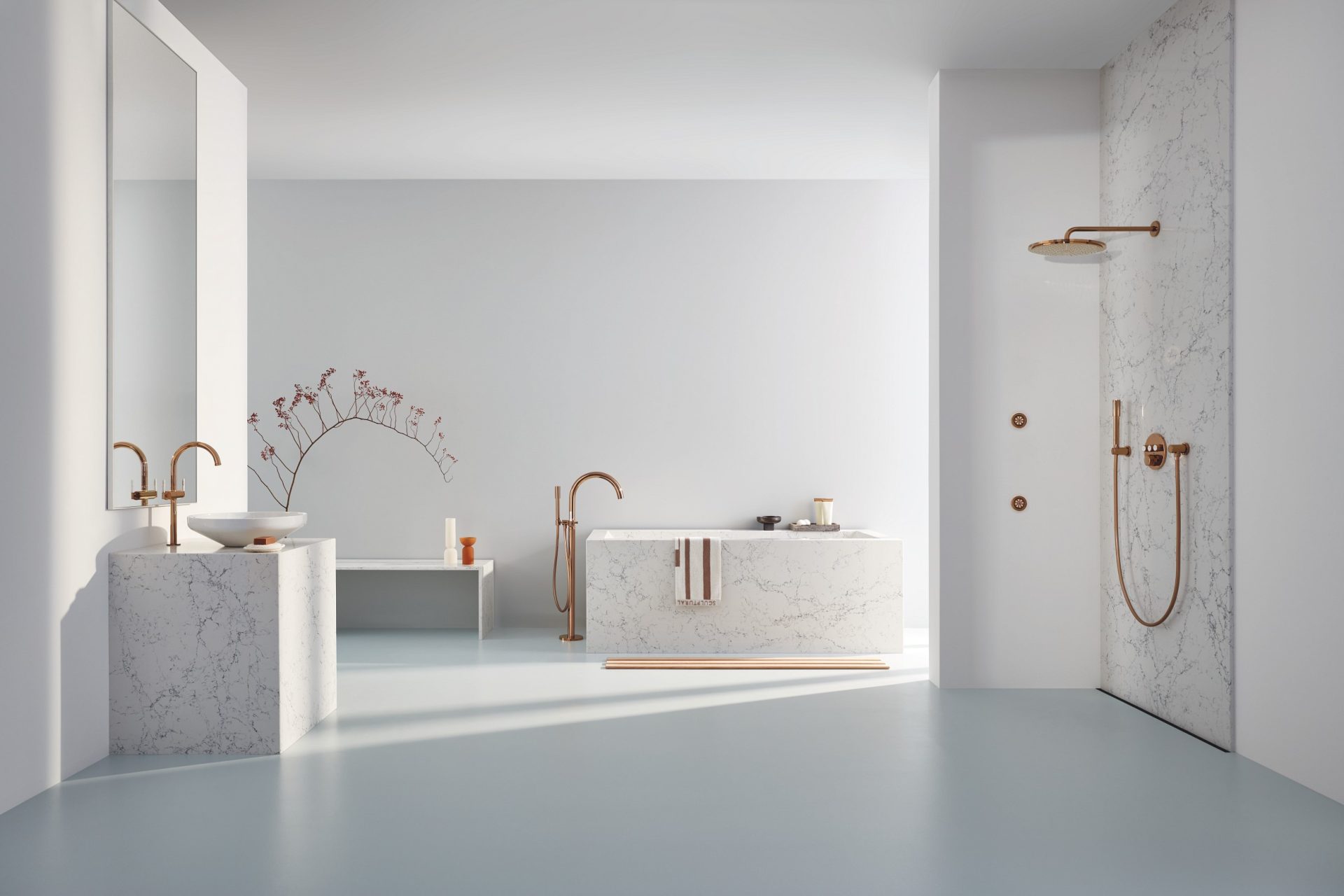 white and grey spacious bathroom with GROHE fittings and shower in gold