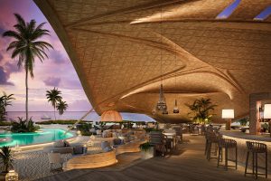 bamboo structure and roof over pool and bar at Corinthia Maldives