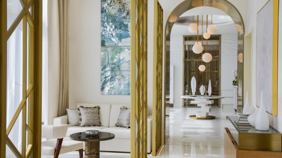 gold and white interior details in corridor leading into ESPA spa at Waldorf Astoria Lusail Doha