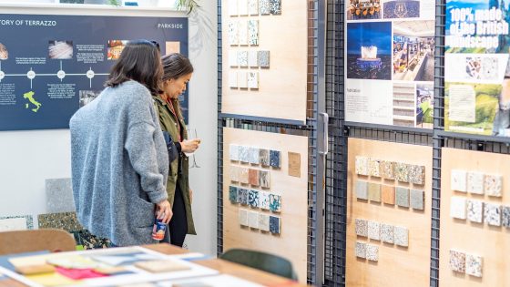 two people looking at tile samples on display in the parkside showroom during Clerkenwell Design Week