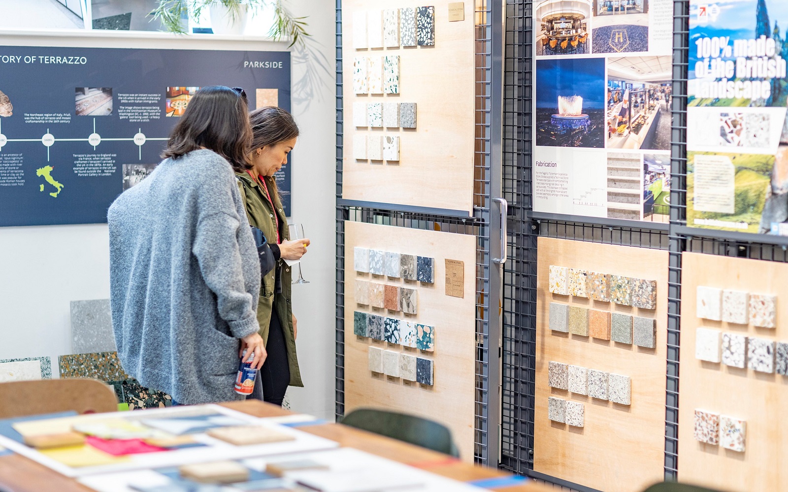 two people looking at tile samples on display in the parkside showroom during Clerkenwell Design Week