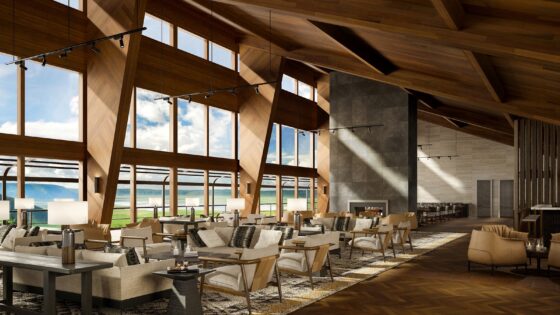 wooden beams and floor to ceiling windows with views across the veld in the lobby at Melia Ngorongoro Lodge