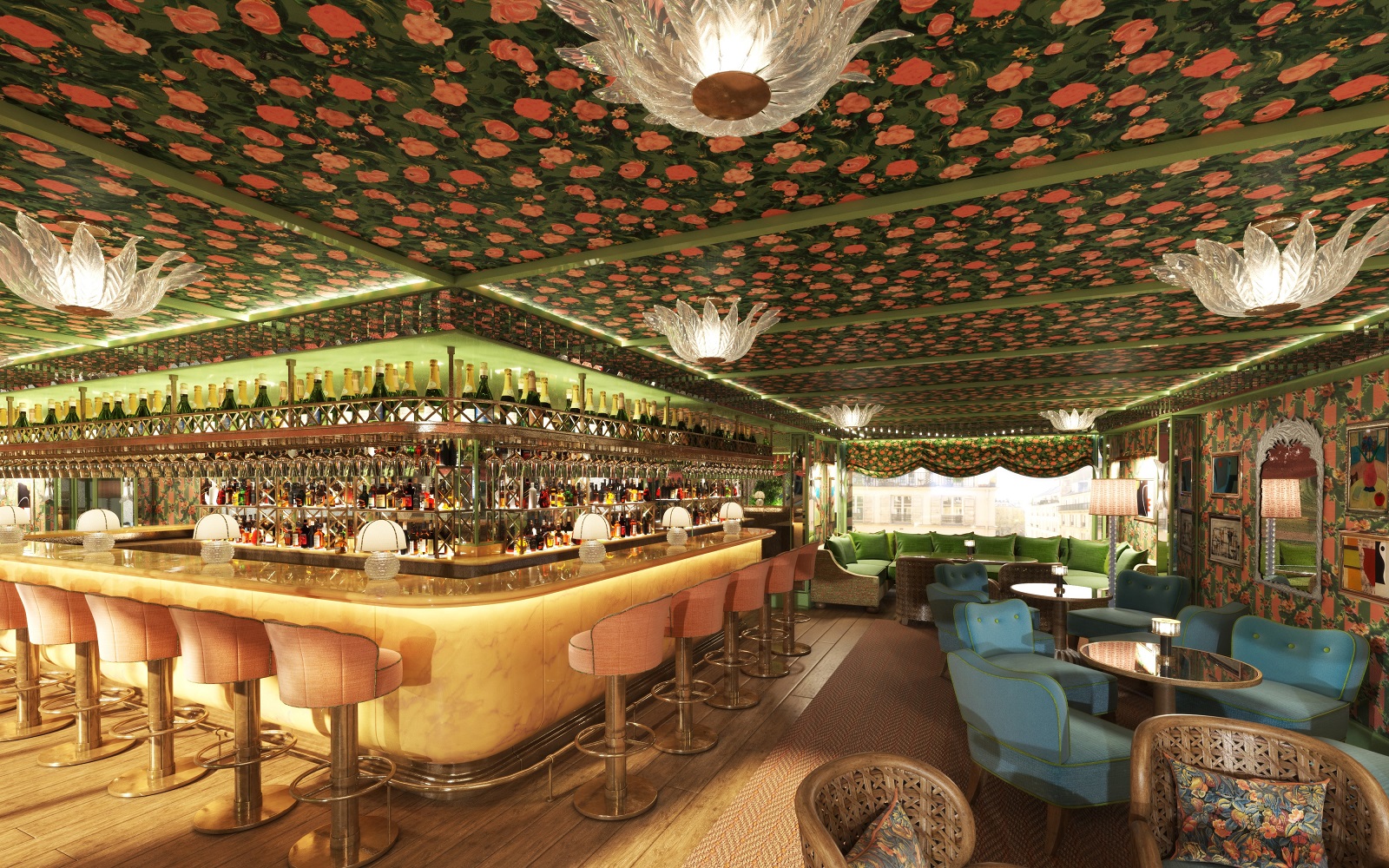 Bar in the hotel La Fantaisie with wallpapered floral ceiling and vintage lights around a central backlit bar