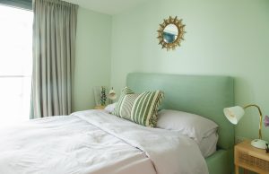 restful sage green bedroom design by Be-kin studio