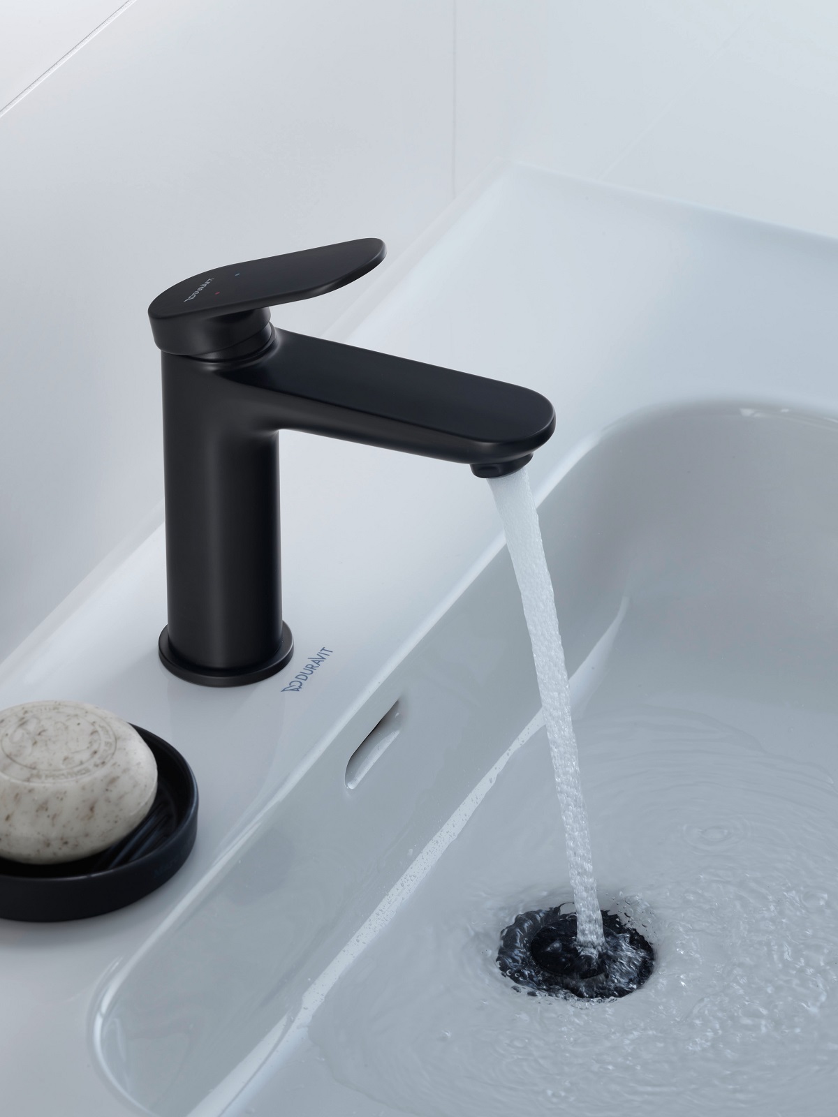 matt black tap on white basin in Duravit Wave design
