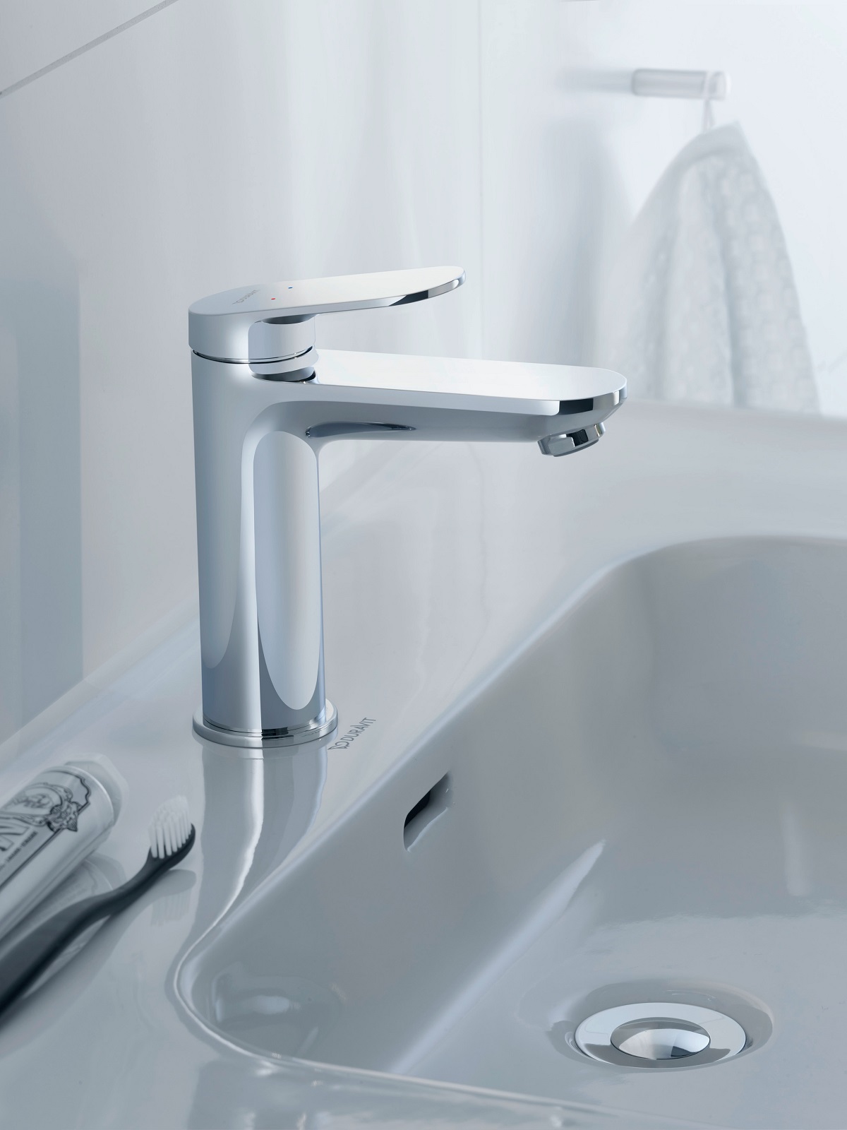 Chrome tap on white basin in Duravit Wave design