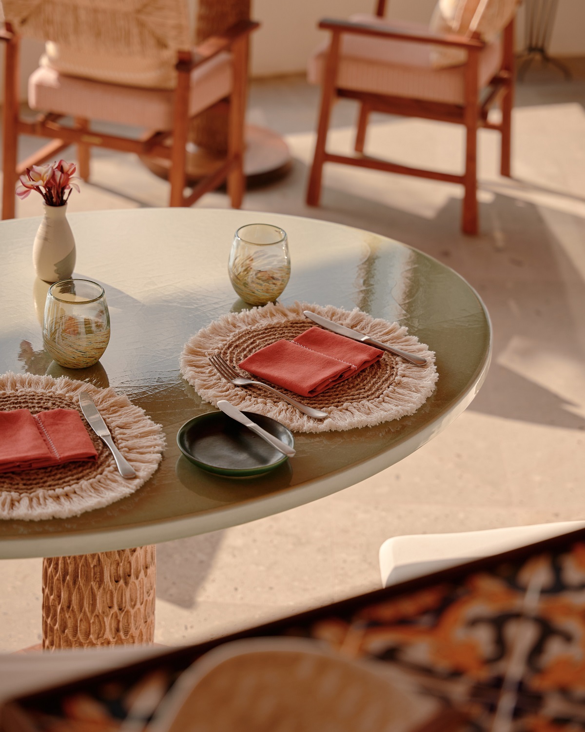 table setting with natural surfaces, mexican inspired patterns and pops of orange