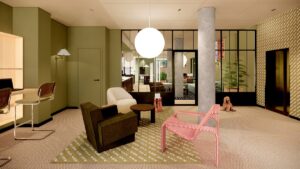 hotel lobby with olive green walls, statement pink chair and a round pendant light in Bob W Helsinki