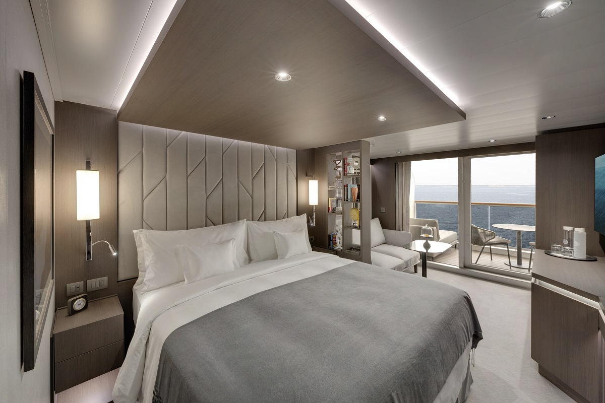 A luxury, muted design scheme inside terrace suite on Explora 1