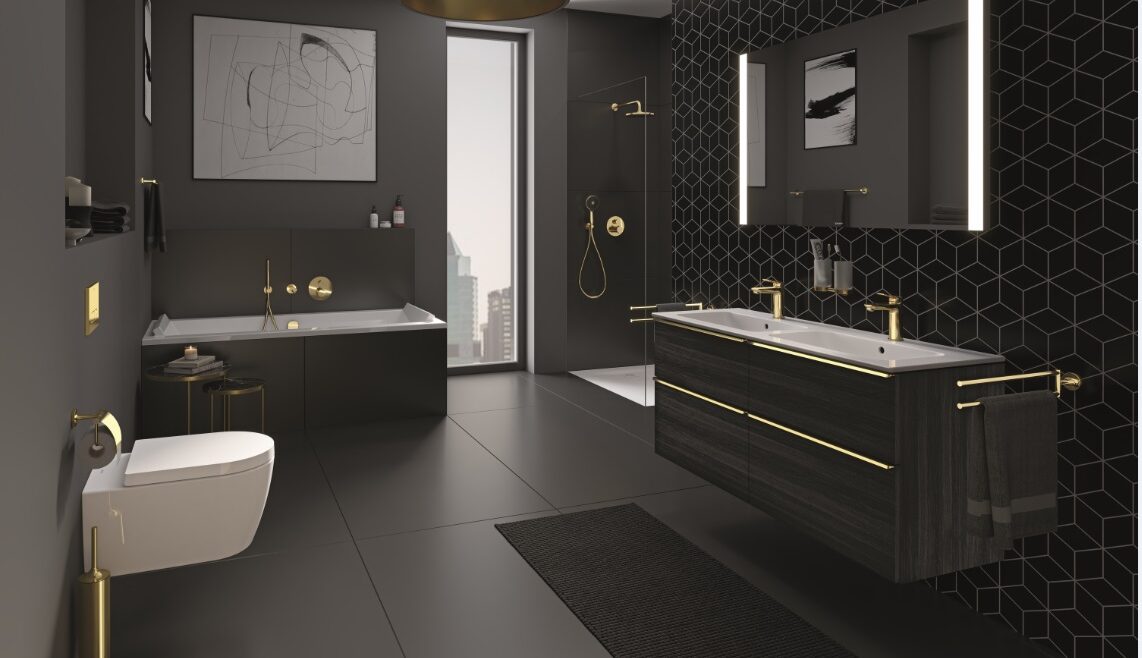 bathroom with black walls and floor with black and gold fittings and fixtures from duravit