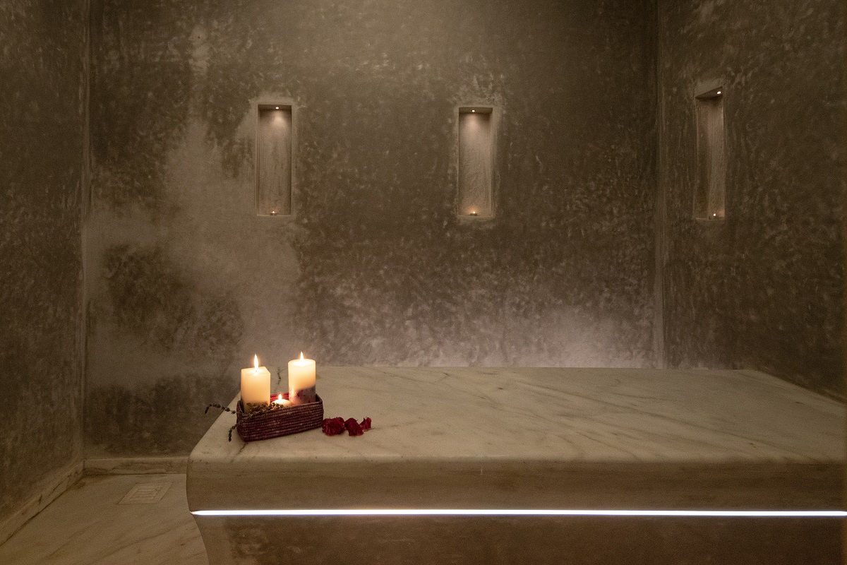 warm stone surfaces and running water in the traditional hammam spa at La Fiermontina Ocean