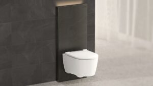 wall hung toilet from Geberit Monolith Plus against brown bathroom wall