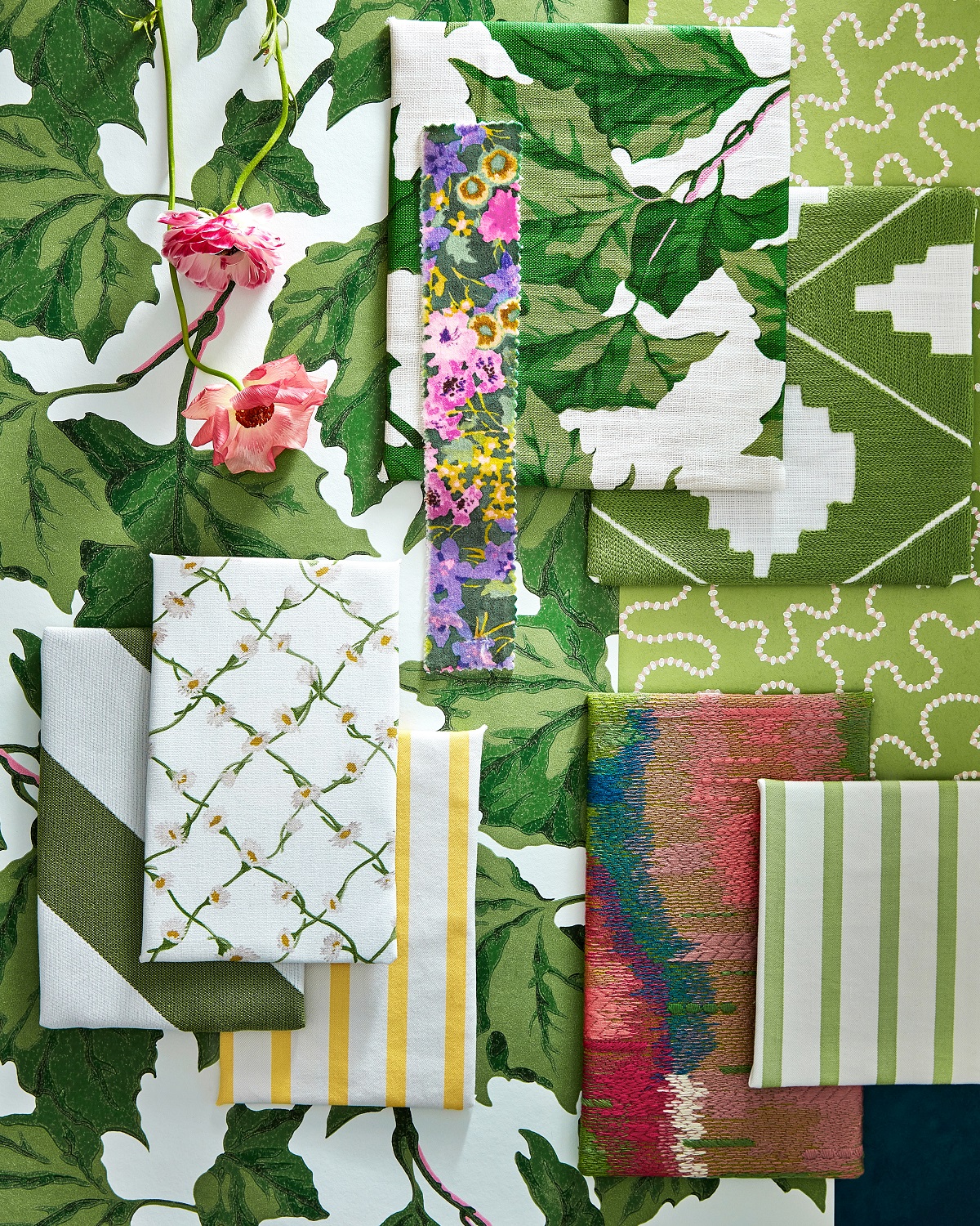 fabric and wallpaper moodboard from the Harlequin x Sophie Robinson collection in greens and yellows with a mix of pattern