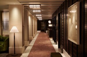 colonnade lights lighting the way down a passage in Nobu London with a design by Dernier & Hamlyn