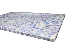 flush design of shower tray by Kaldewei with blue and grey abstract geometric surface design
