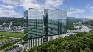 reflective facade of DoubleTree by Hilton-Seoul-Pangyo- with the forest in the foreground
