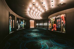 gallery style corridor in the casino exhibiting photographs and costumes from past shows