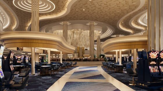 blue carpet leading into Fontainbleu Las Vegas casino floor below curved ceiling