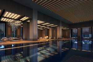 serene indoor swimming pool with low level lighting in hotel spa area