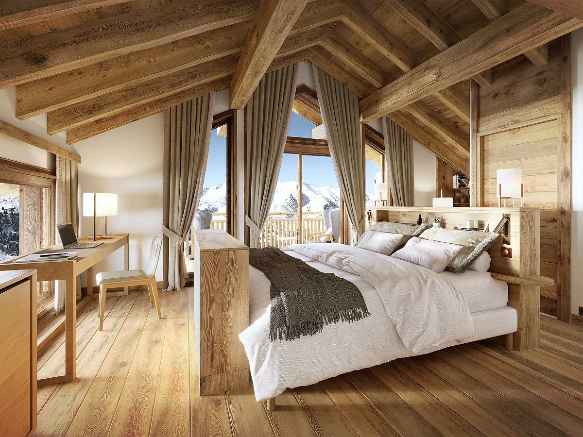 Luxury bedroom inside alpine style accommodation in Meribel