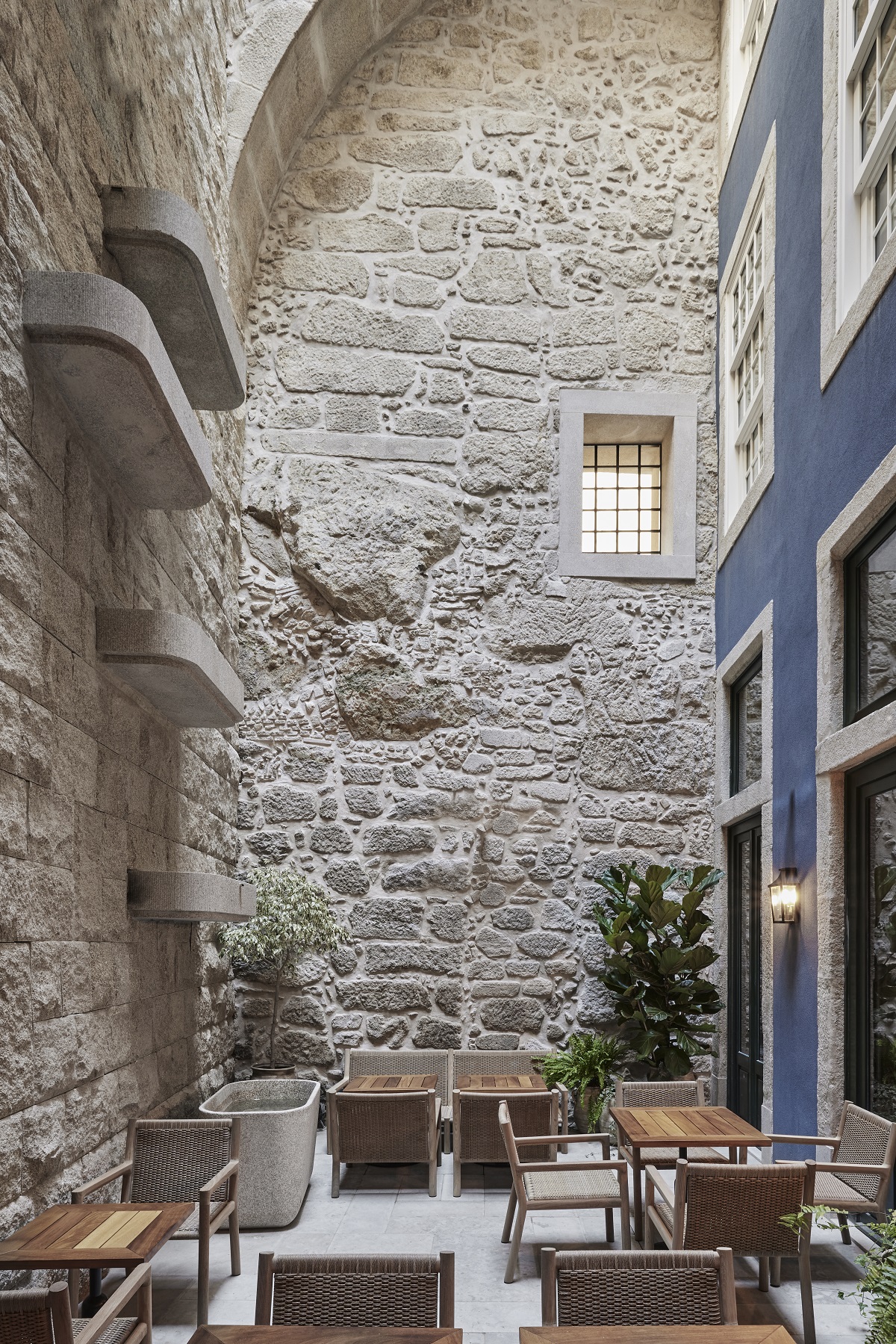 A courtyard with exposed bricks inside The Largo