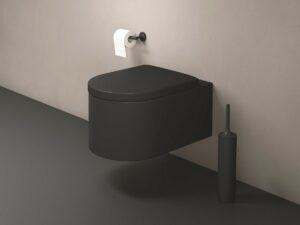 soft matt black wall hung Millio by Bullo toilet against taupe wall and black floor
