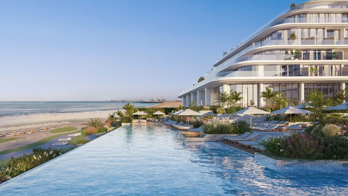 render of side view of Gran Melia Dubai facade and infinity pool overlooking the beach