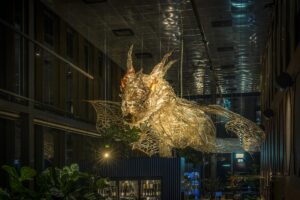 architectural lighting statement in Hotel Draak of nordic dragon suspended