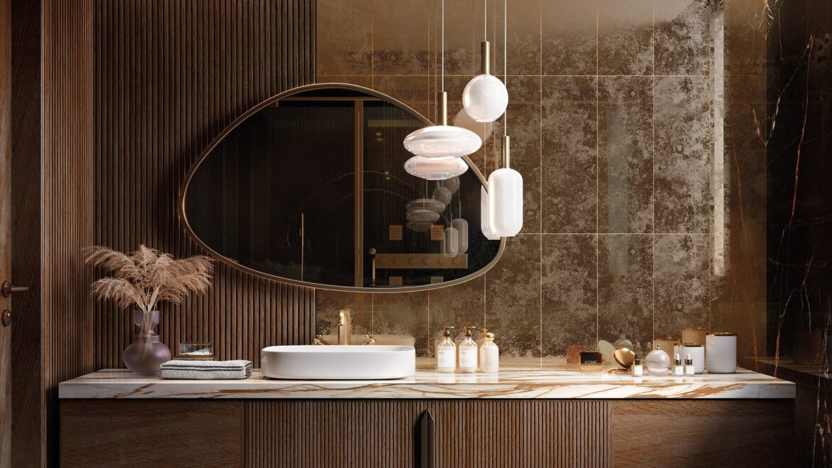 reflective gold tiles behind bathroom vanity and mirror