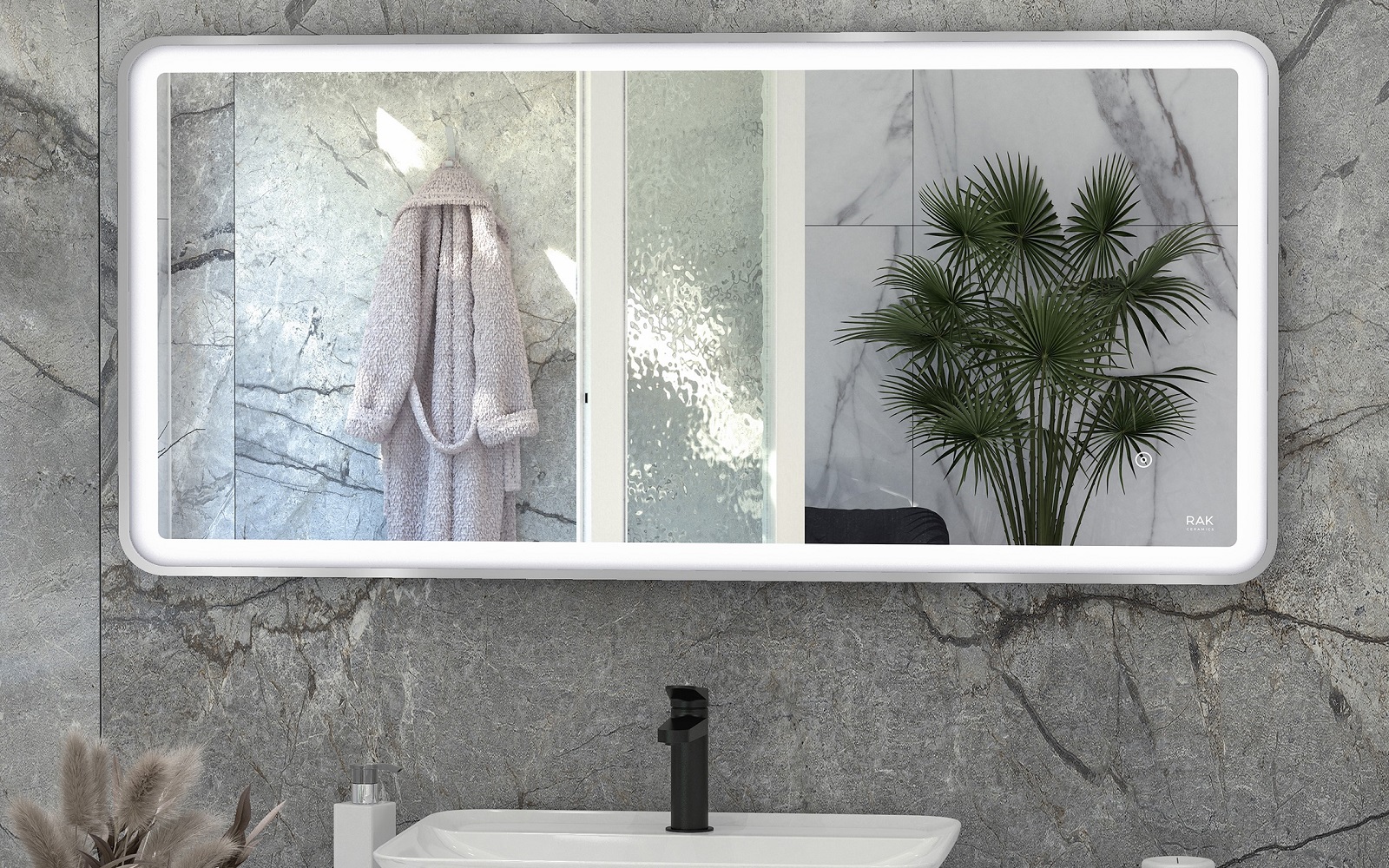 rectangular bathroom mirror from RAk above basin reflecting bathrobe and indoor plant