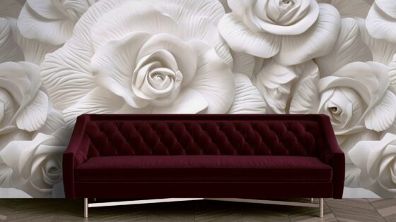 burgundy upholstered sofa in front of oversized white rose wallcovering from Newmor