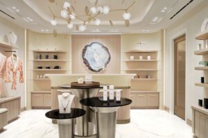 large agate wall art in spa entrance with sculptural lighting above displays