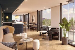 rooftop bar at The Store Oxford transformed into a contemporary space with soft cream furniture and wooden floor with floor to ceiling windows over central Oxford